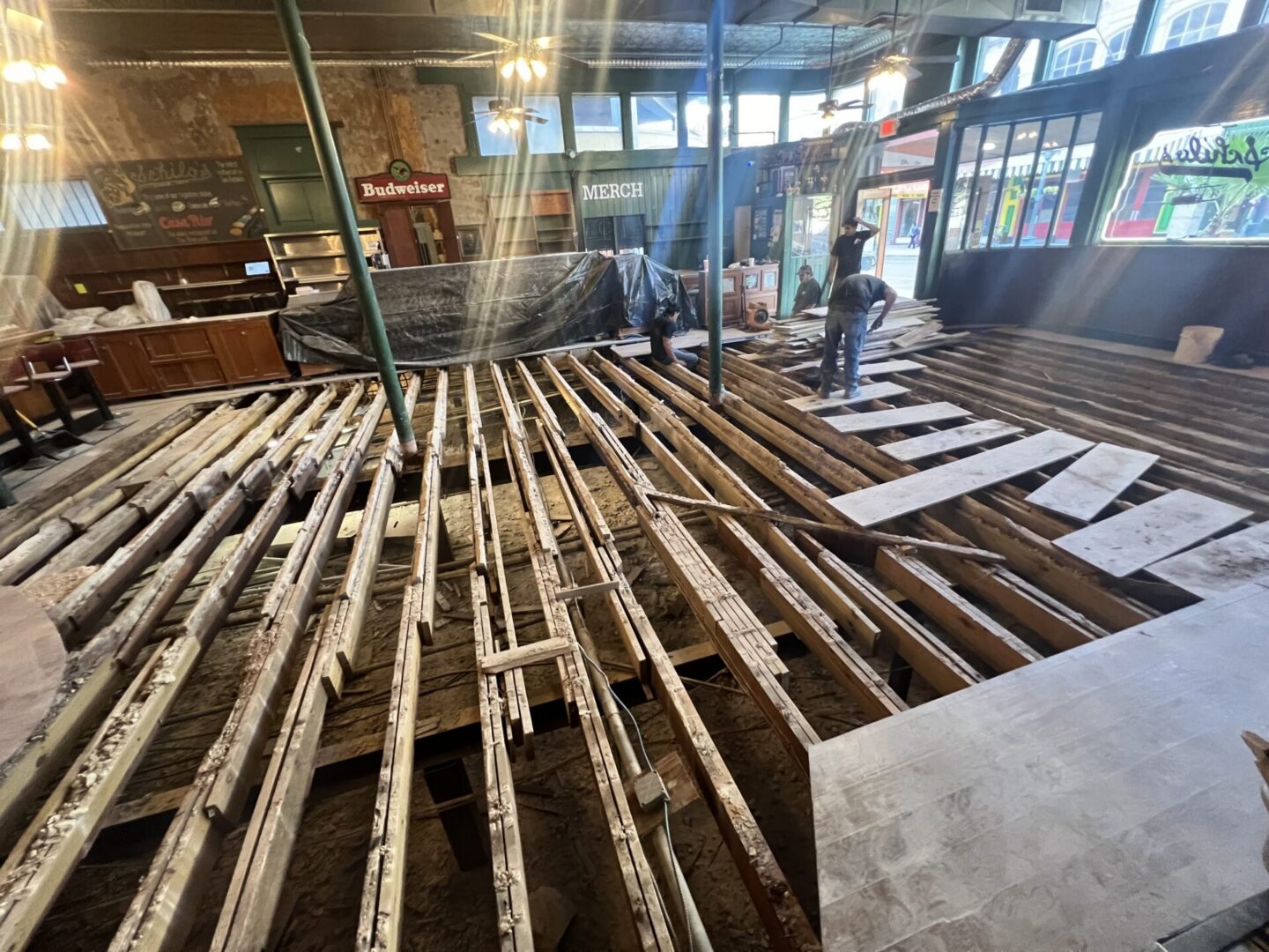 Bar interior with exposed floor joists