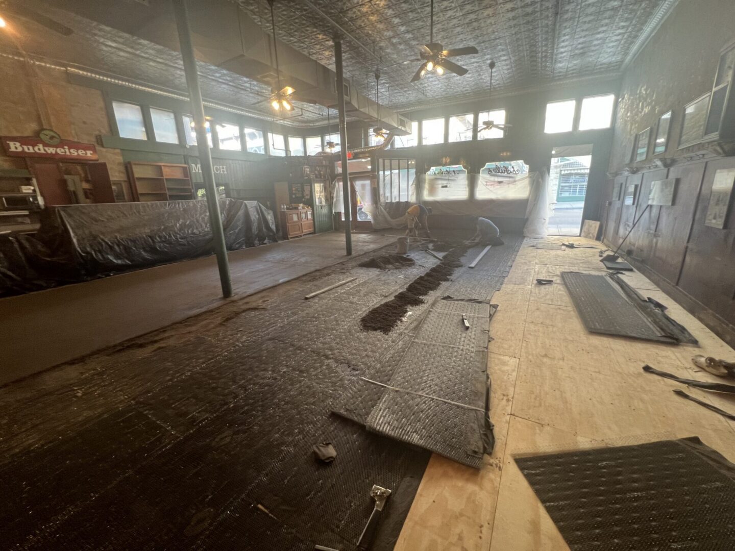 Old bar interior under renovation with exposed floor