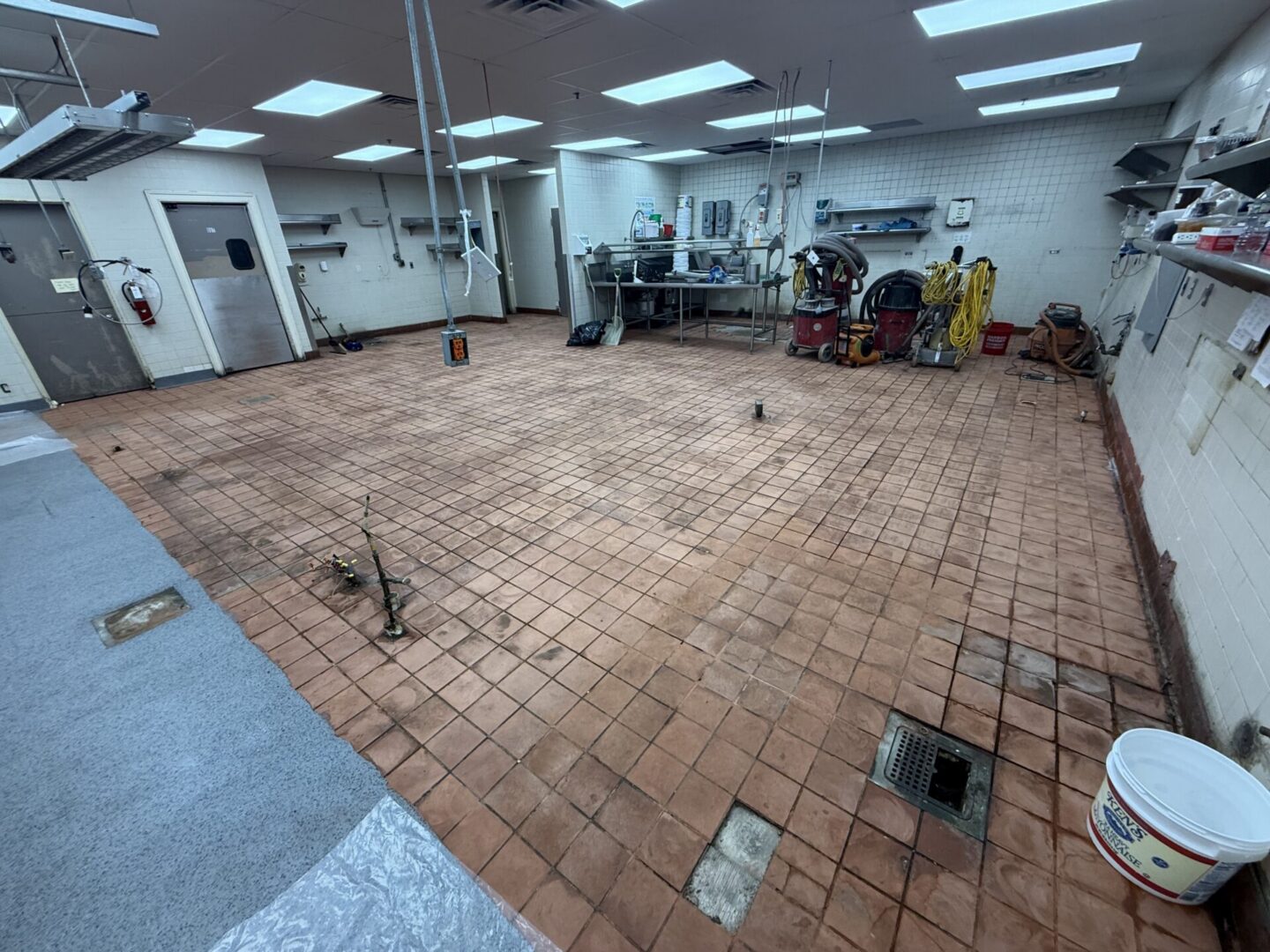 Empty commercial tiled room under renovation